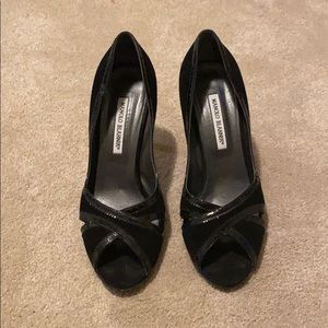 Gently used manolo blahnik black pumps